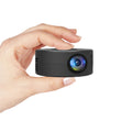 Black portable mini projector for children with mobile phone connectivity measuring 110mm x 110mm