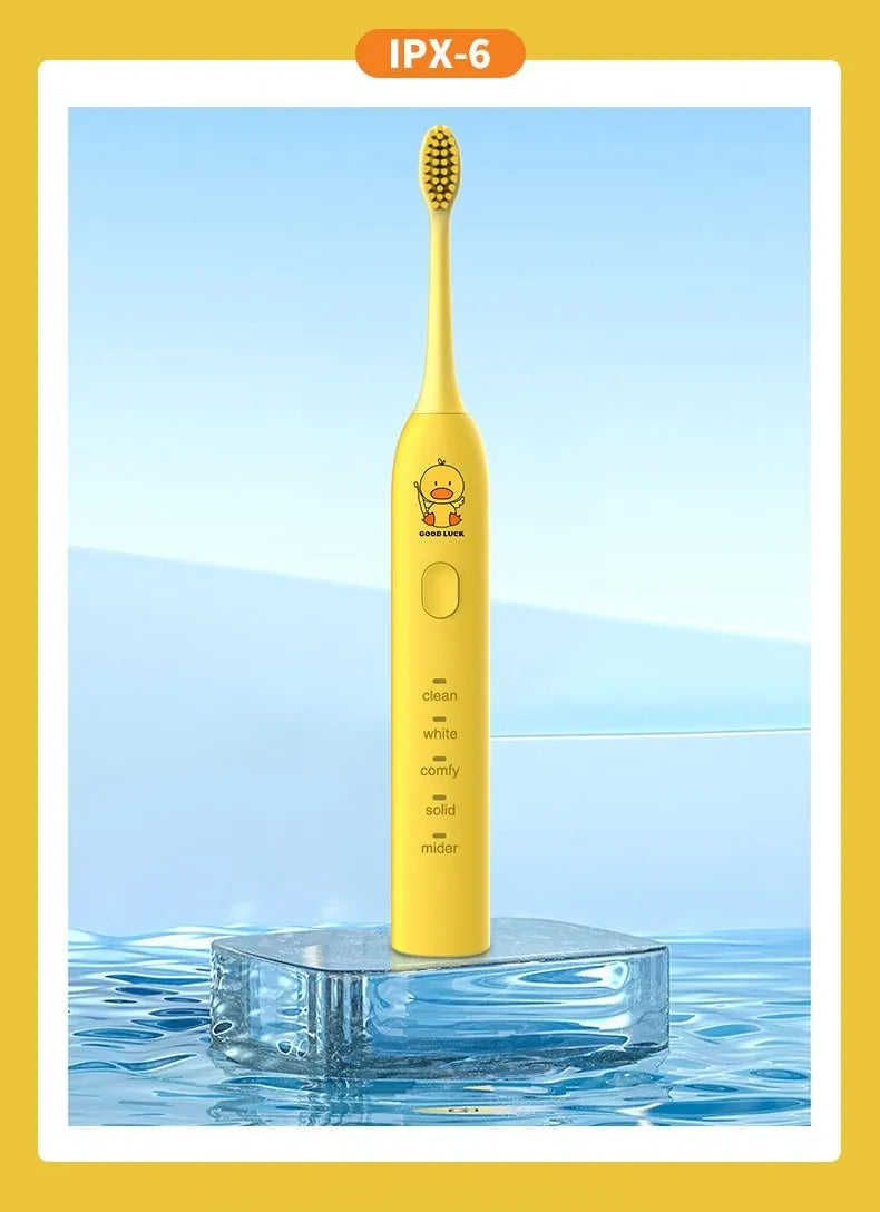 Yellow rechargeable electric toothbrush with small duck design and USB charging cable