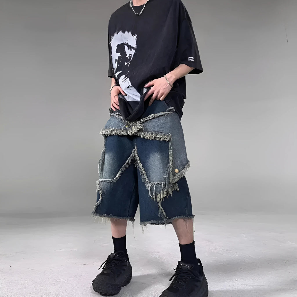 Blue cotton men's denim shorts with frayed hem and embroidered star, loose fit style.