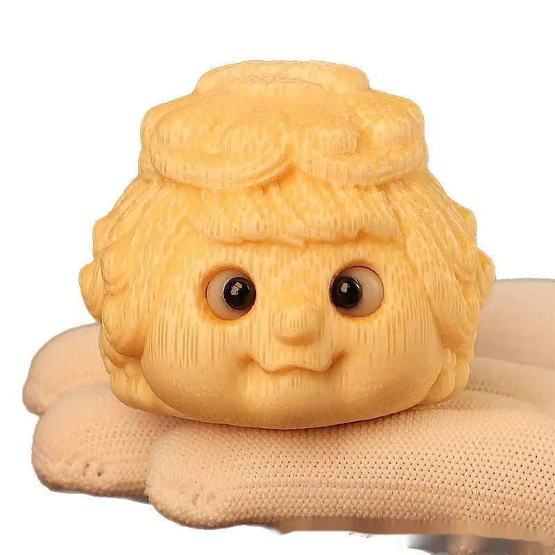 Solid bamboo golden toad princess ornament showing detailed hand carving and natural grain patterns
