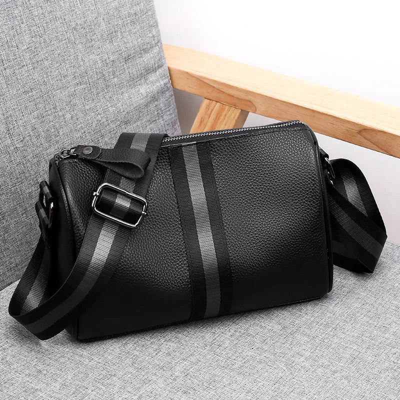 Black genuine leather one-shoulder crossbody bag showing front view and dimensions