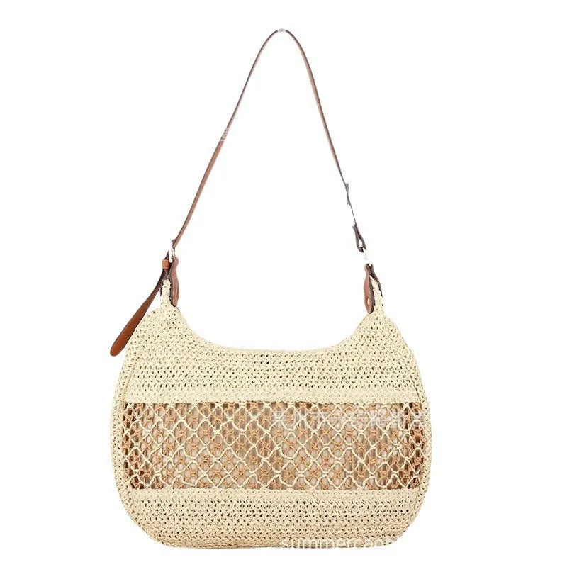 Women's khaki straw cross body bag with a square shape and outer pocket.