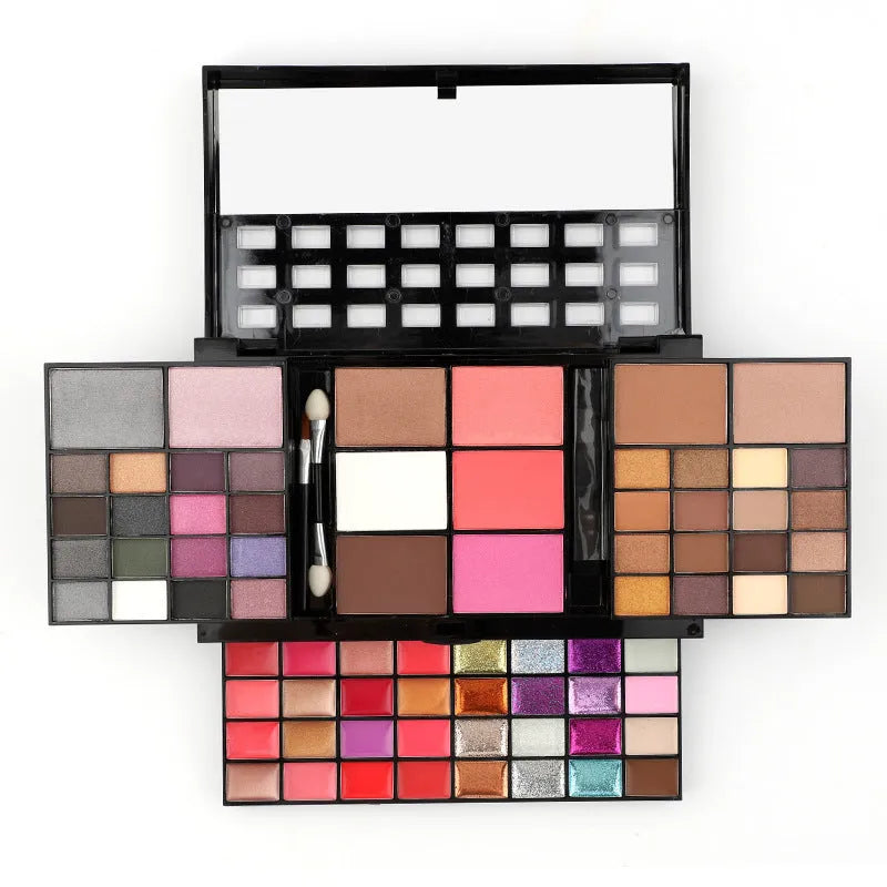 74 colour makeup palette open showing four layers of eyeshadow, lip gloss, blush and contour powders with included brushes.