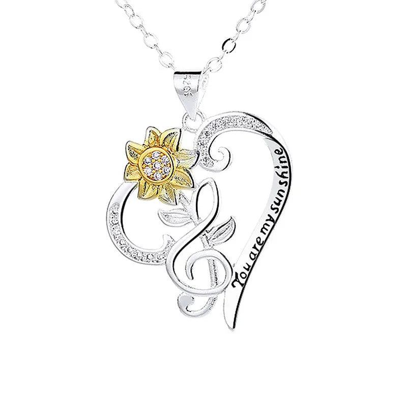 Two-colour copper sunflower pendant on heart-shaped clavicle chain, pastoral style, flower shape