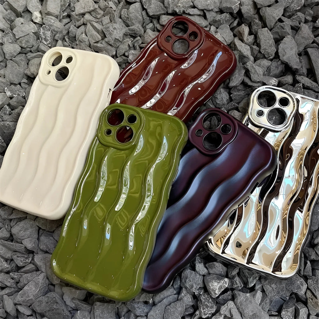 Silicone iPhone case with water ripple texture in green, shown on an iPhone 17 Pro Max.