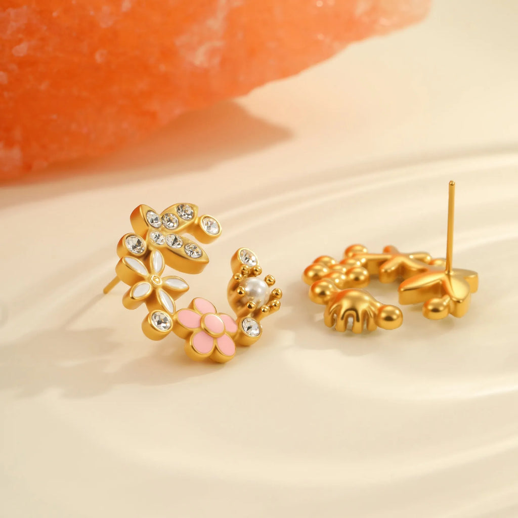 Colourful oil diamond flower stud earrings with gold plating on stainless steel.