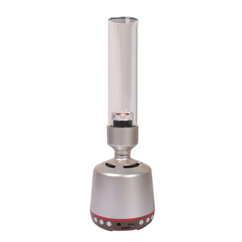 White silver cylindrical Bluetooth speaker with candlelight night light, 27.7 cm tall