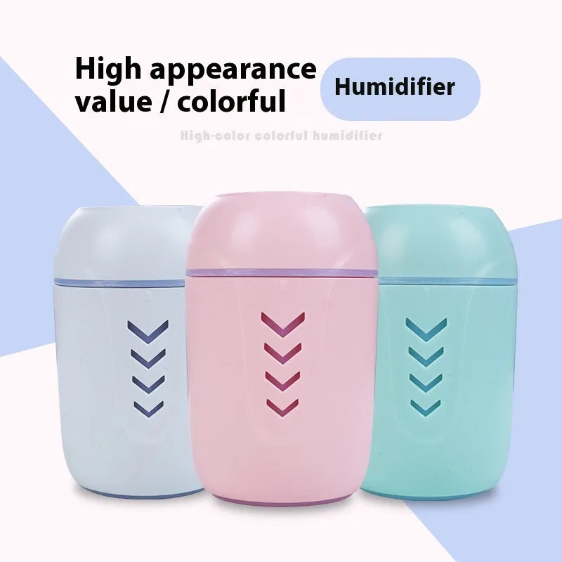 Small round portable air purifier in blue colour with USB cable for car or desktop use.