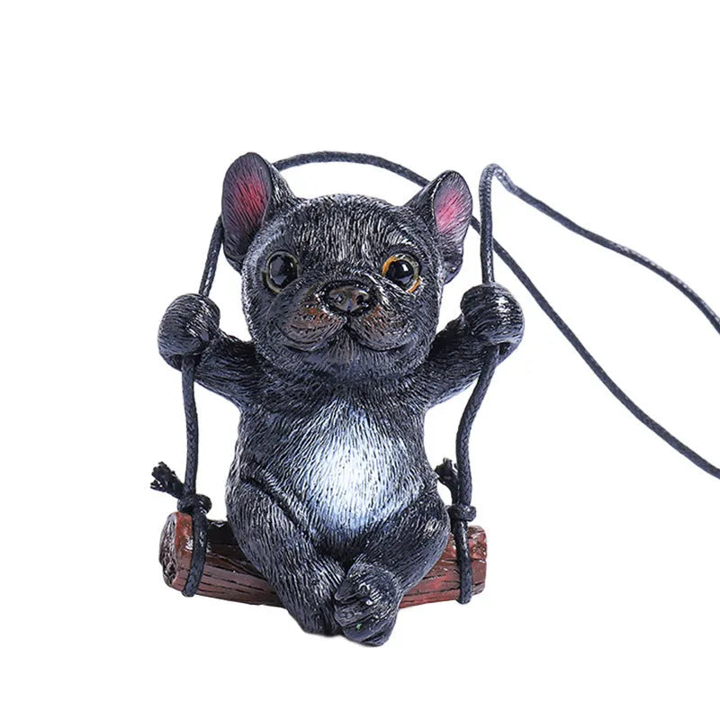 Cartoon-style resin bulldog car pendant hanging from a rearview mirror.