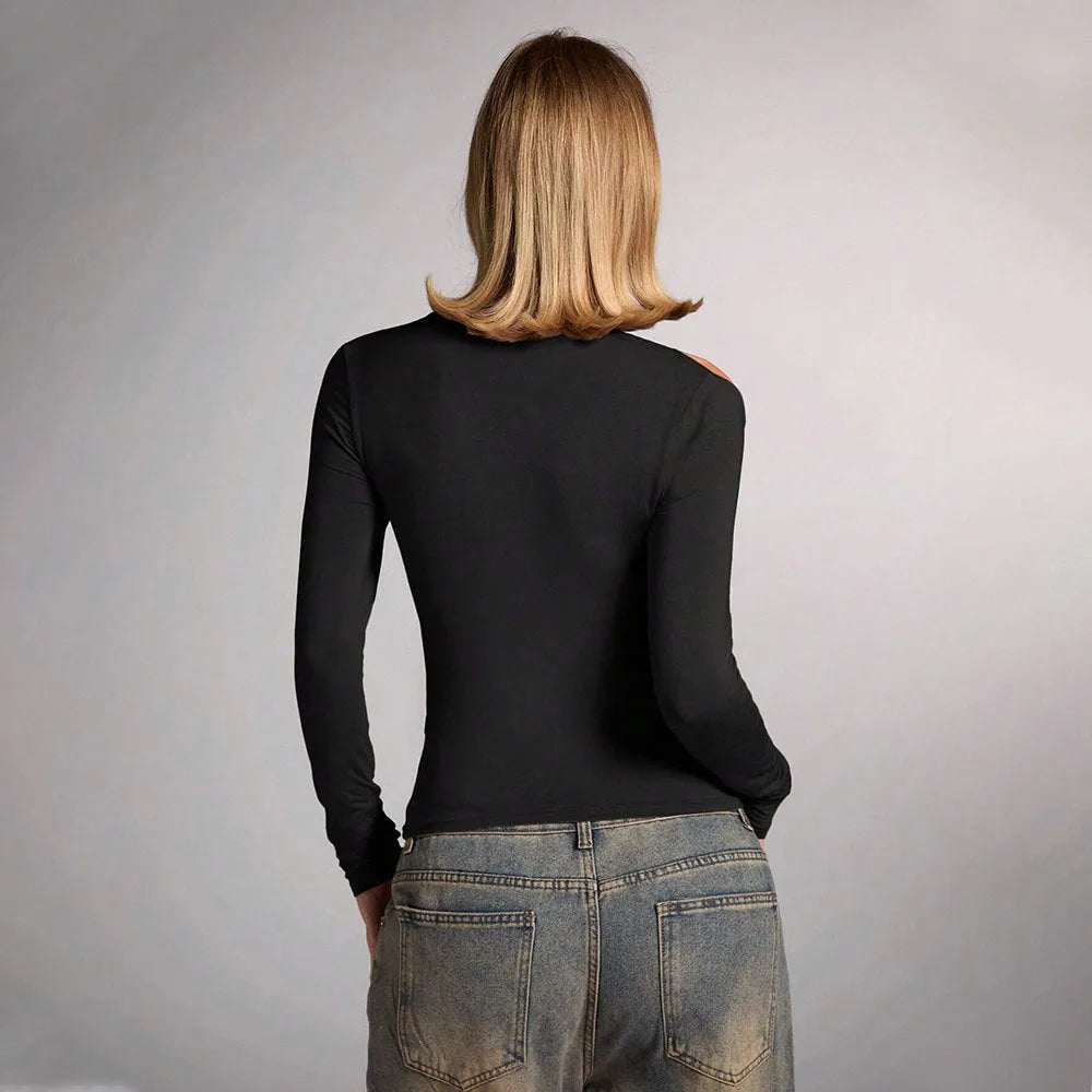 Women's black halter top with shoulder-baring neckline, long sleeves, and slim fit silhouette