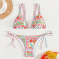 Women's lace-up split swimsuit with brief bottom in polyester fabric
