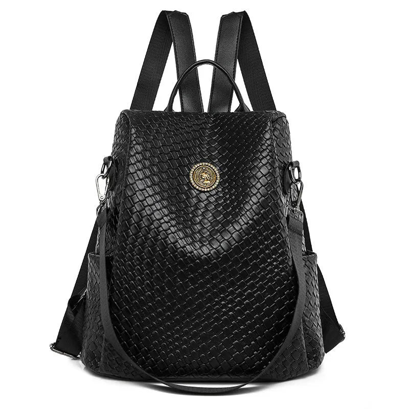 Black women's anti-theft backpack with weaving detail and multiple compartments for travel