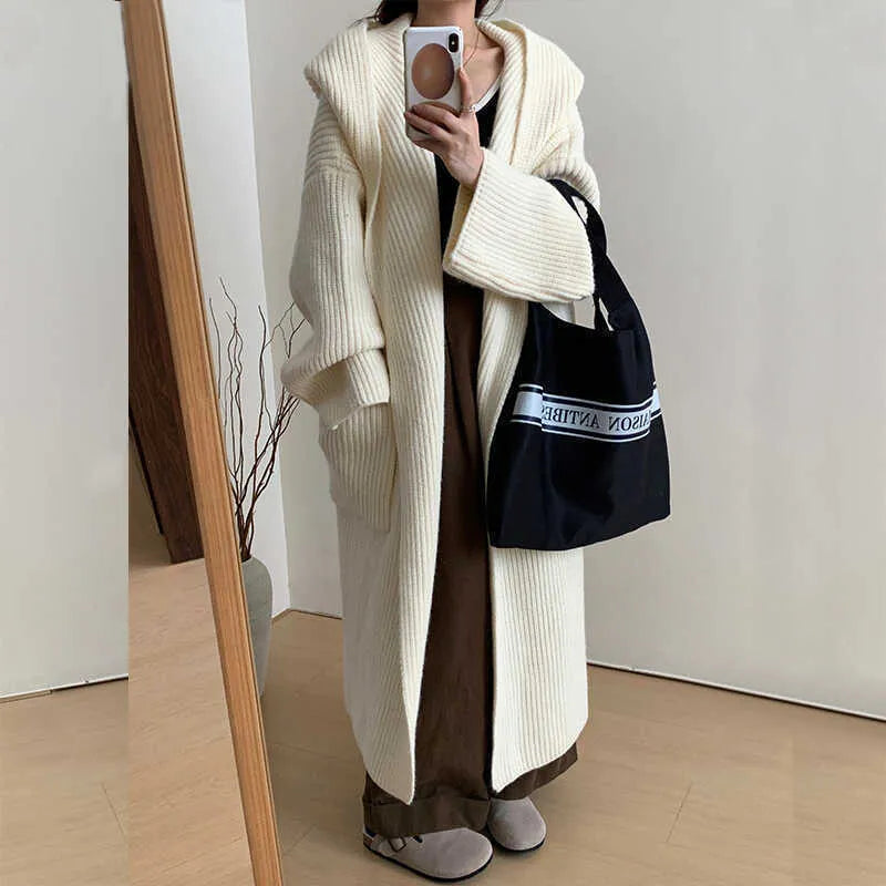 Women's loose hooded cardigan coat in acrylic fibre with 80cm length and raglan sleeves