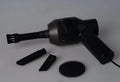 Black cordless USB desktop mini vacuum cleaner for keyboard and computer dust clean-up.