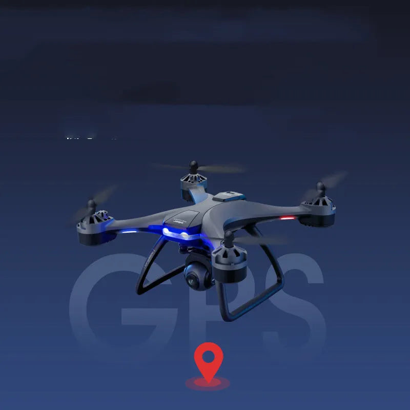 Plastic quadrocopter drone with four rotors, a handheld remote controller, and spare fan blades on a landing gear.