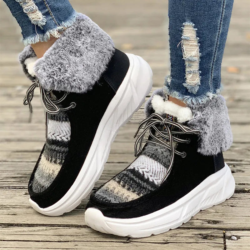 Women's beige suede snow boots with lace-up front and thick rubber sole
