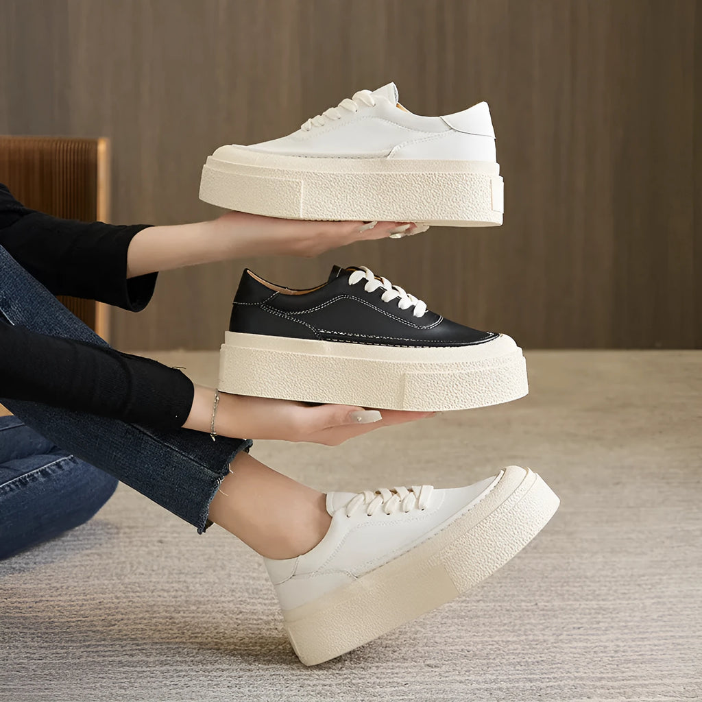 Women's black platform casual sports board shoes with tied design and round toe