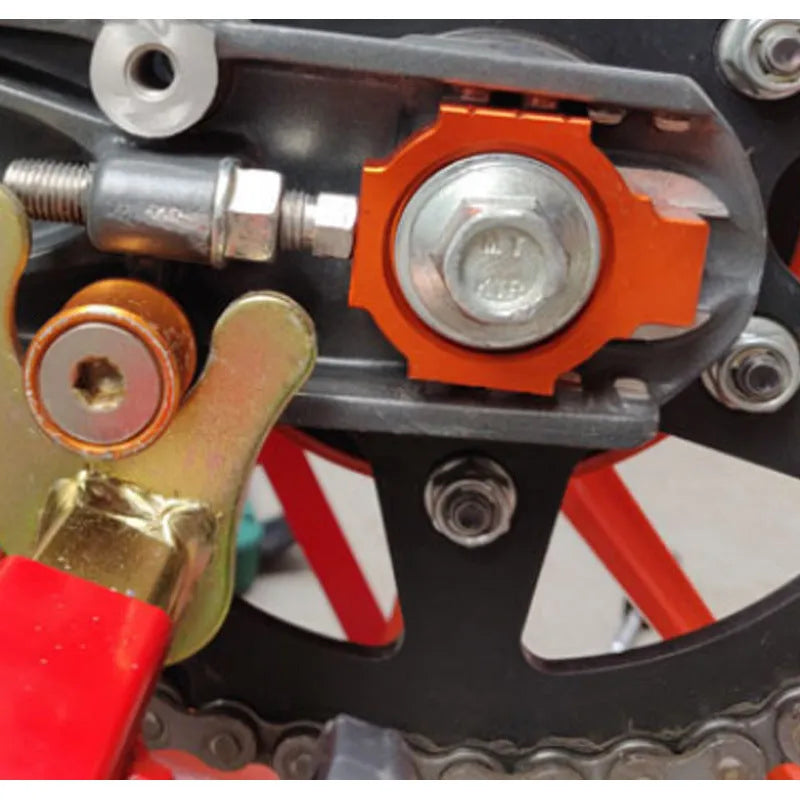 Orange KTM motorcycle rear fork regulator screw pair for DUKE 200 390 990