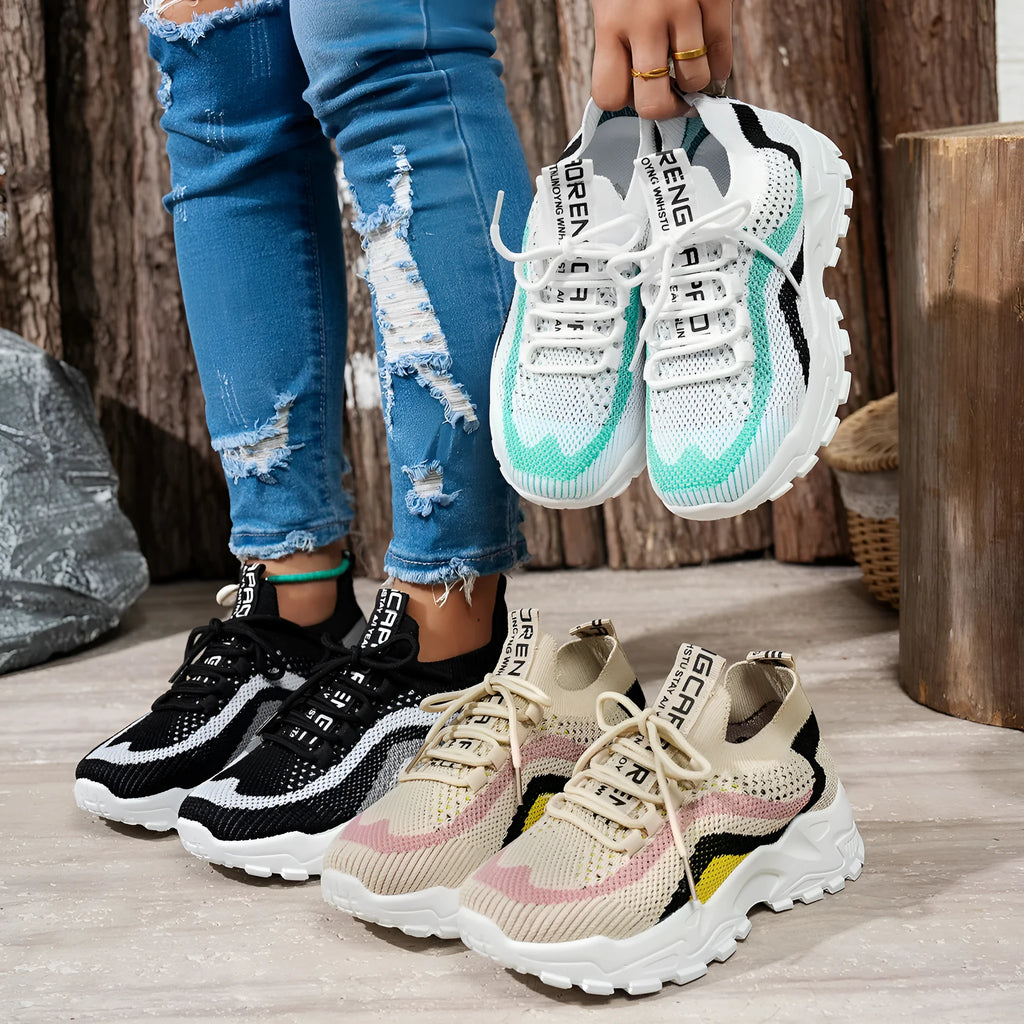Women's lightweight soft bottom casual sports shoes in three colour options with front lace-up design.