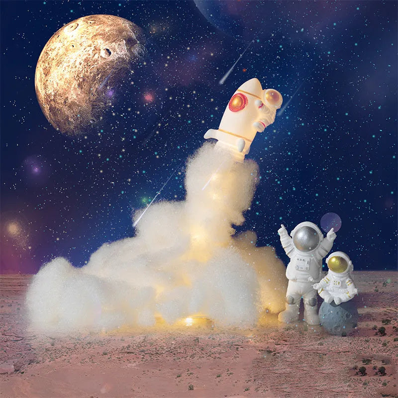 DIY LED Astronaut Rocket night light kit with string lights and assembly components on a desktop