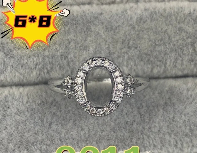 Oval denier copper ring with 6x8mm stone, star detail, and open-mouth band in Korean style.