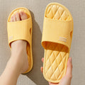 Anti-slip lozenge texture PVC home slippers in solid colours for indoor summer wear
