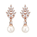 Geometric women's earrings with micro inlaid zircon stones and pearl accents in three metal colours