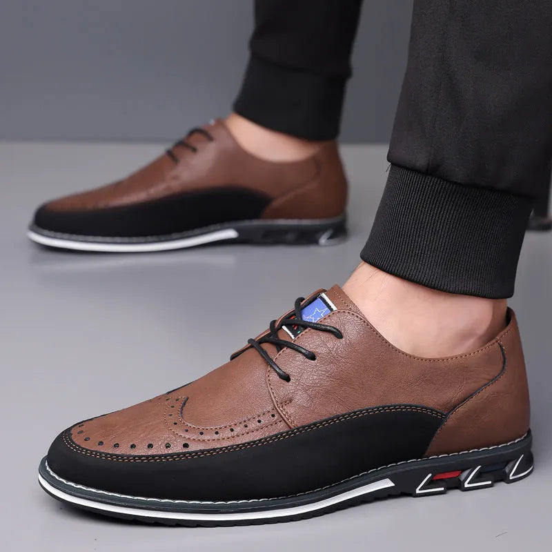 Men's black leather toe cap casual slip-on shoes with a rubber sole on a white background.