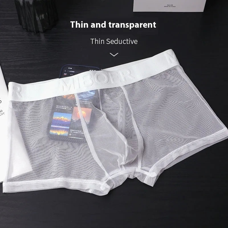 Men's thin solid-colour boxer shorts in quick-drying polyester fabric on a white background.