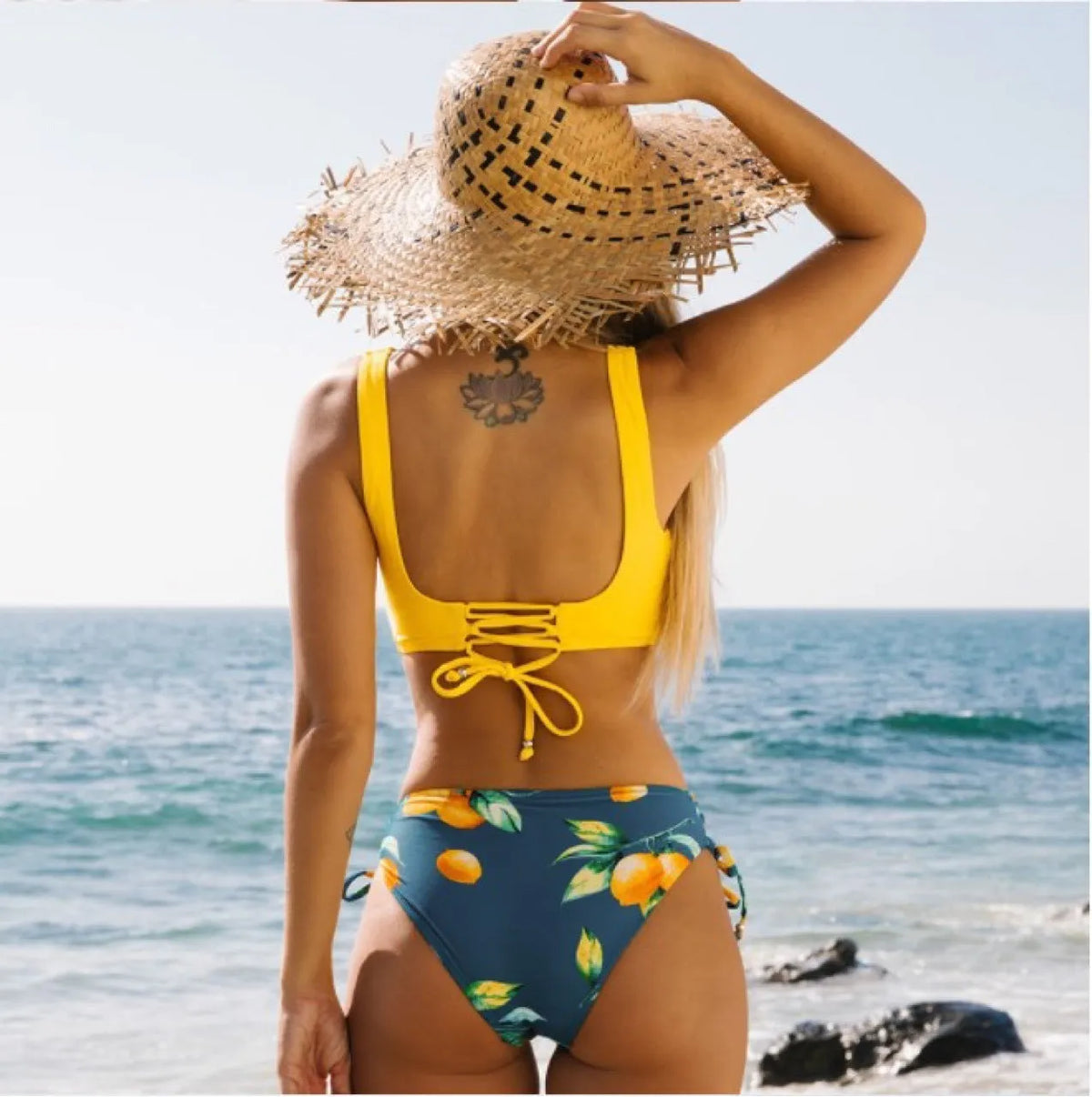 Yellow bikini swimsuit for women, sleeveless briefs style, nylon fabric, cotton blend lining, sizes S to 2XL
