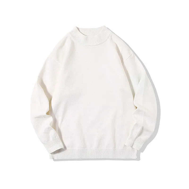 A man's solid colour round neck pullover sweater with long sleeves in a loose, casual fit.
