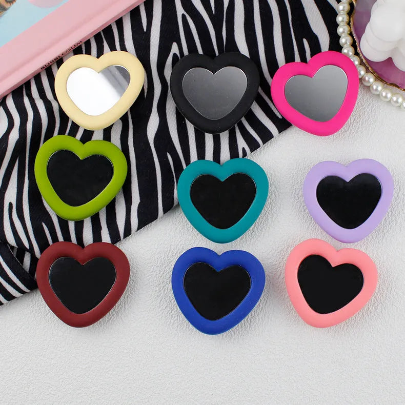 Love silicone foldable mobile phone holder portable stand in one of nine colour options for desktop use