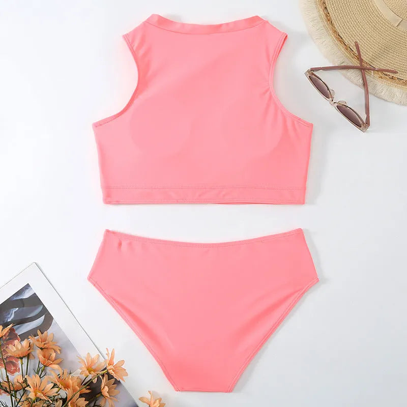 Pink high waist split bikini swimsuit set with bra top and shorts on a mannequin