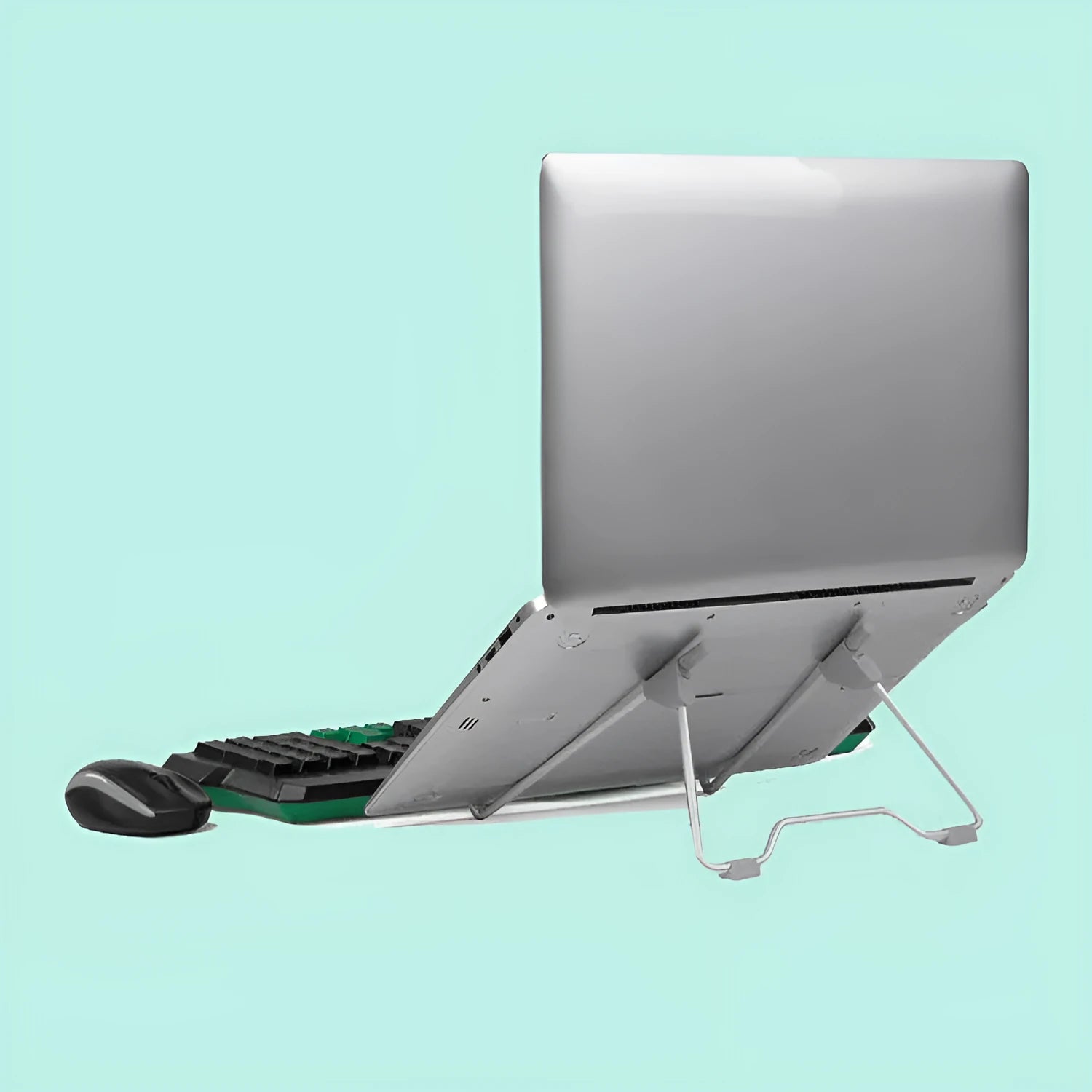 Grey aluminium alloy and engineering plastic foldable mobile phone and laptop stand on a desk.