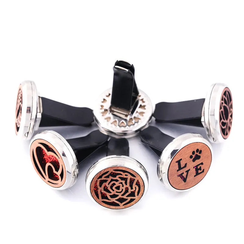 Circular car wood and alloy aromatherapy clip with incense holder, shown in one of 20 available colours.