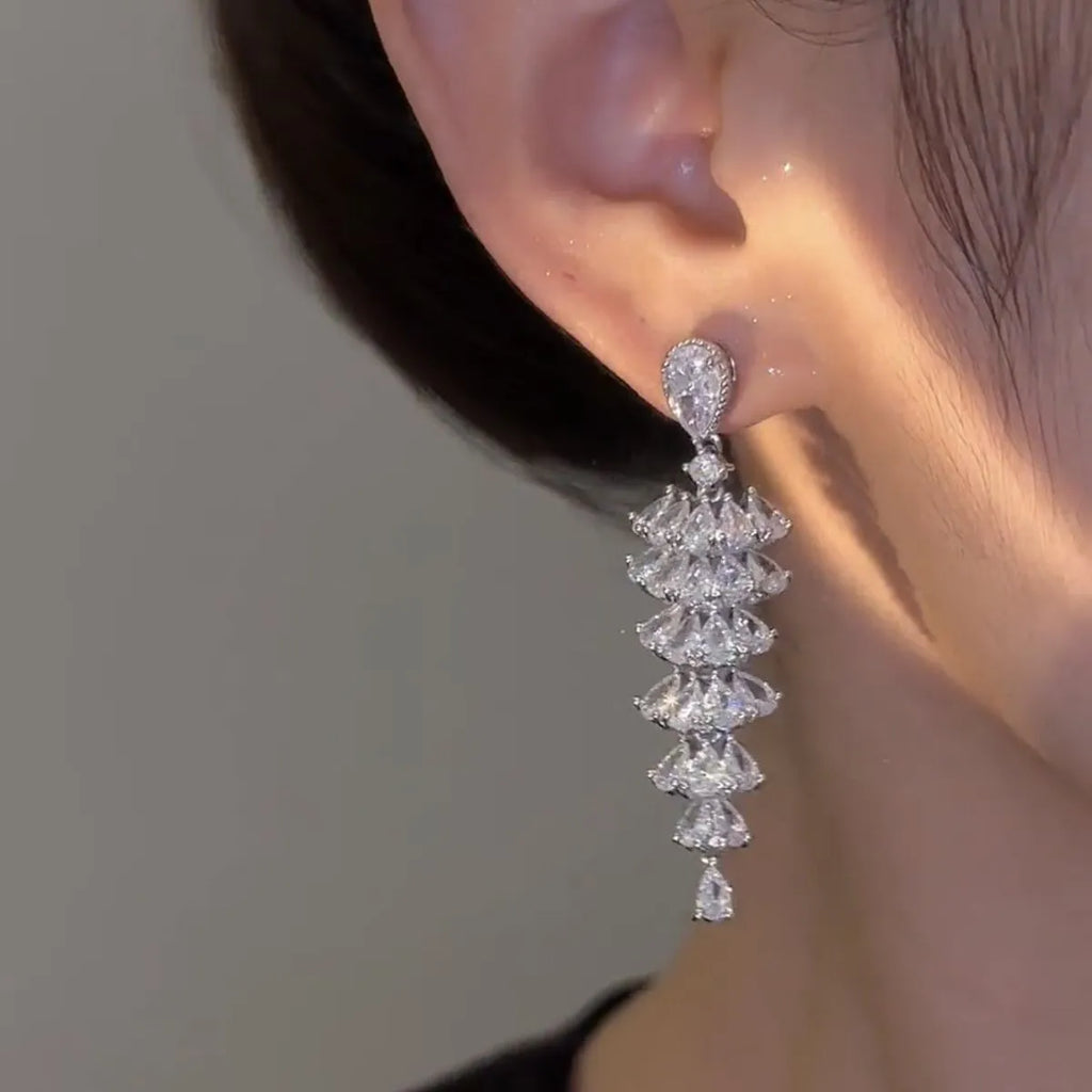 Silver pagoda Christmas tree drop earrings with sparkling zircon elements on copper construction