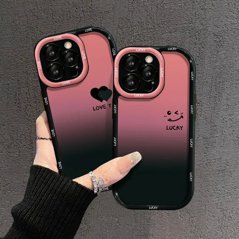 Cream coloured acrylic phone case with black gradient love heart design, showing fine-hole cut-outs for ports.