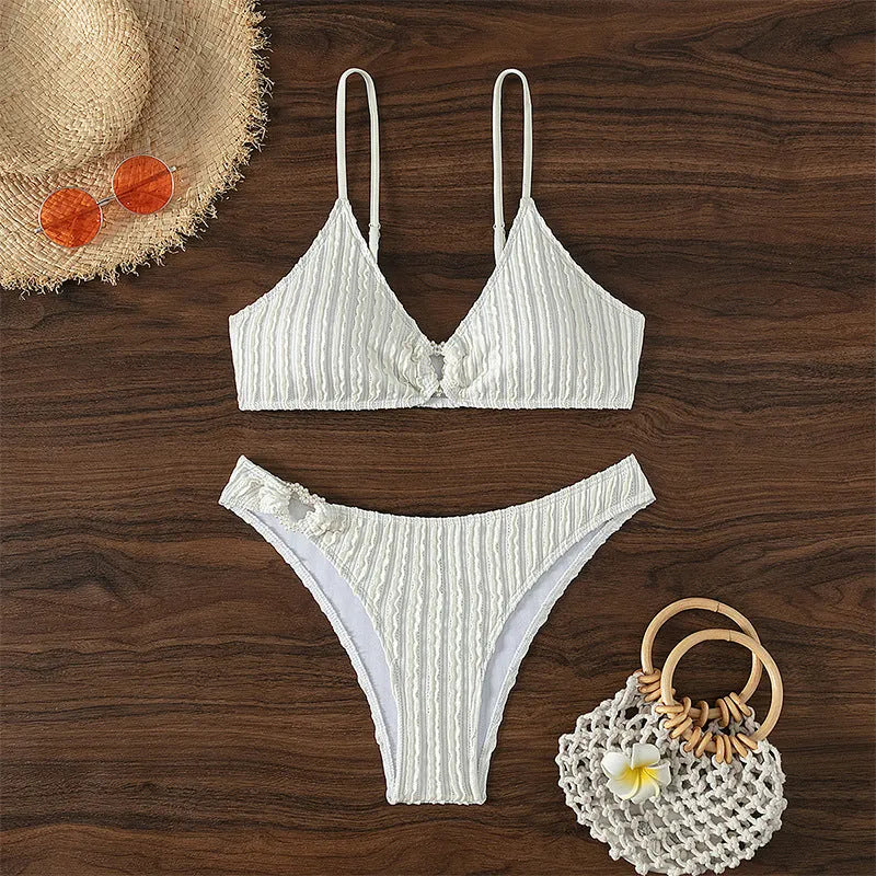 White women's V-neck beach split swimsuit with matching shorts