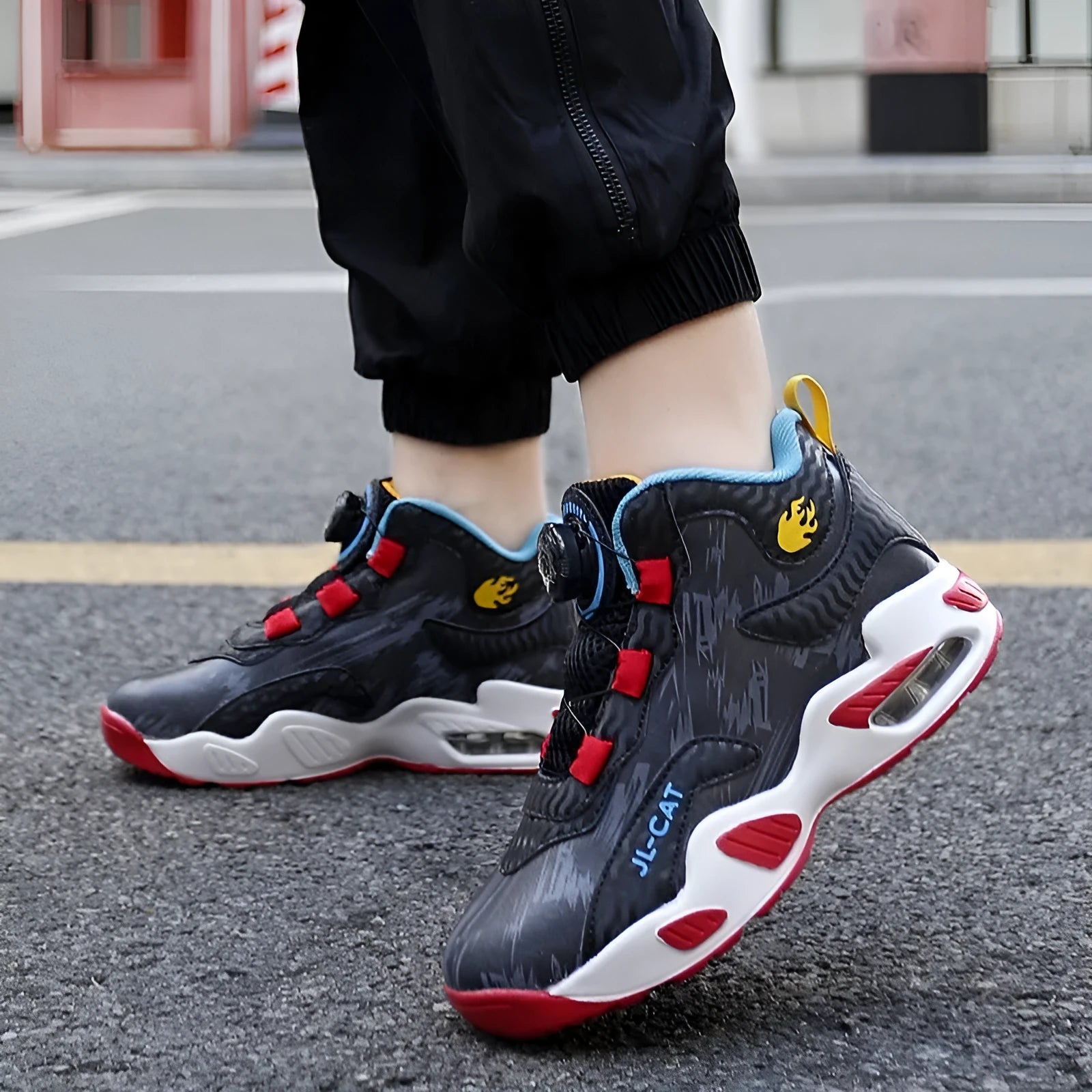 Children's rotating button basketball shoes in various colours with a synthetic leather upper and PU sole.