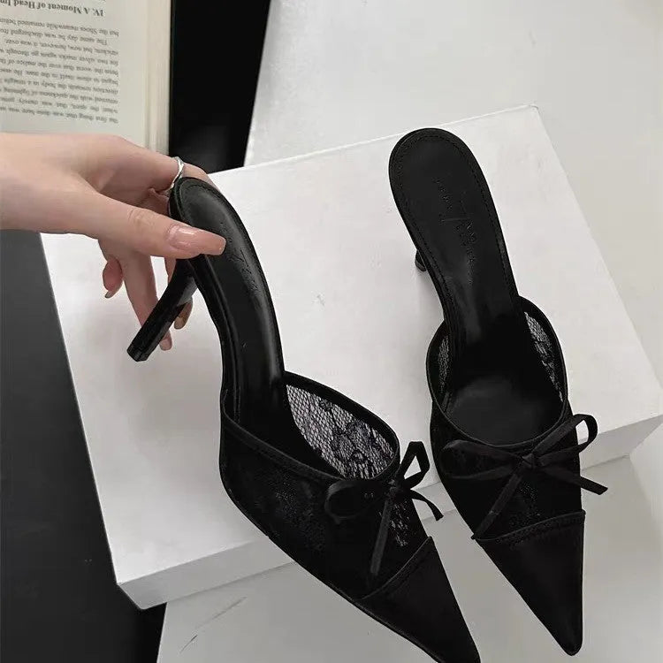 Women's light brown lace bowknot pointed toe high heels with mesh upper on a neutral background