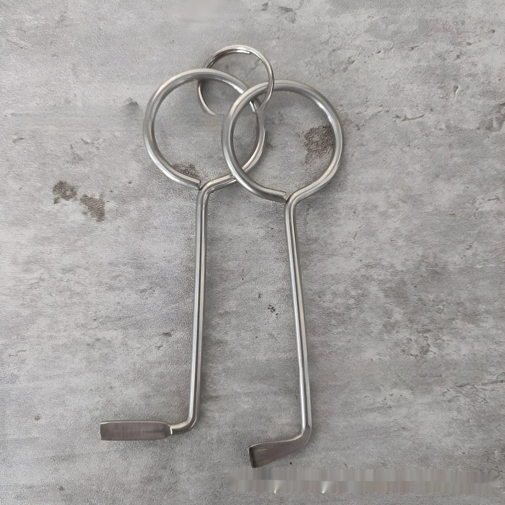 Two alloy steel wrench tools from a portable set for universal household and automotive use.