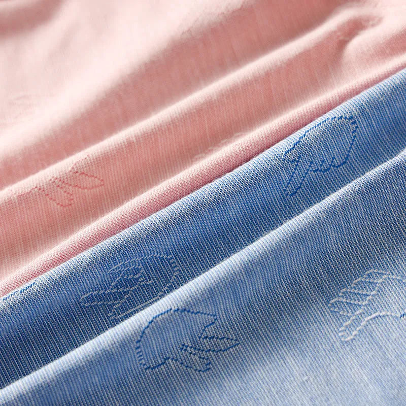 Modal low waist jacquard briefs in colourful blue on a grey background.