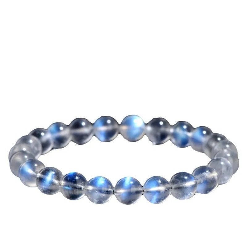 Natural cream body blue moonlight crystal bracelet showing various bead size options on a white background.