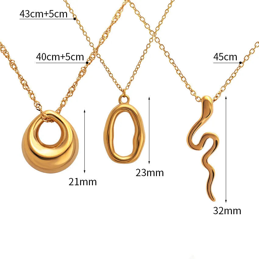 Stainless steel snake bones chain necklace with geometric glossy ring pendant in golden irregular ring finish
