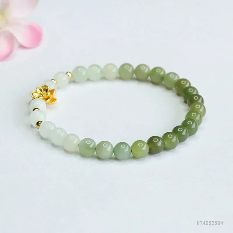 Hand-woven Hetian jade bracelet with 6mm flower beads showing sunshine water gradient colour