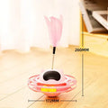 Pink plastic cat stick toy with turntable base measuring 17x10cm for kitten play