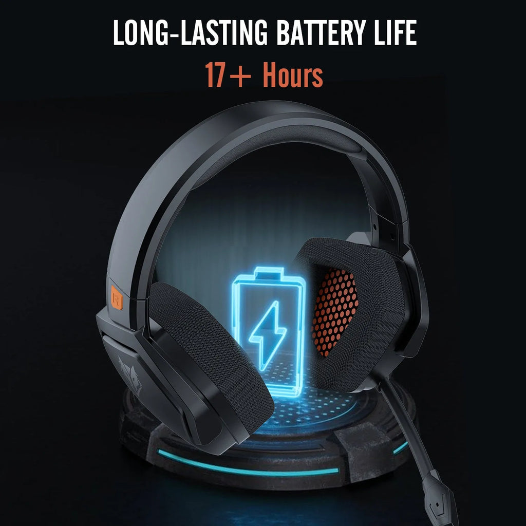 Black and orange wireless gaming headset with over-ear cups and a built-in microphone on a grey background.