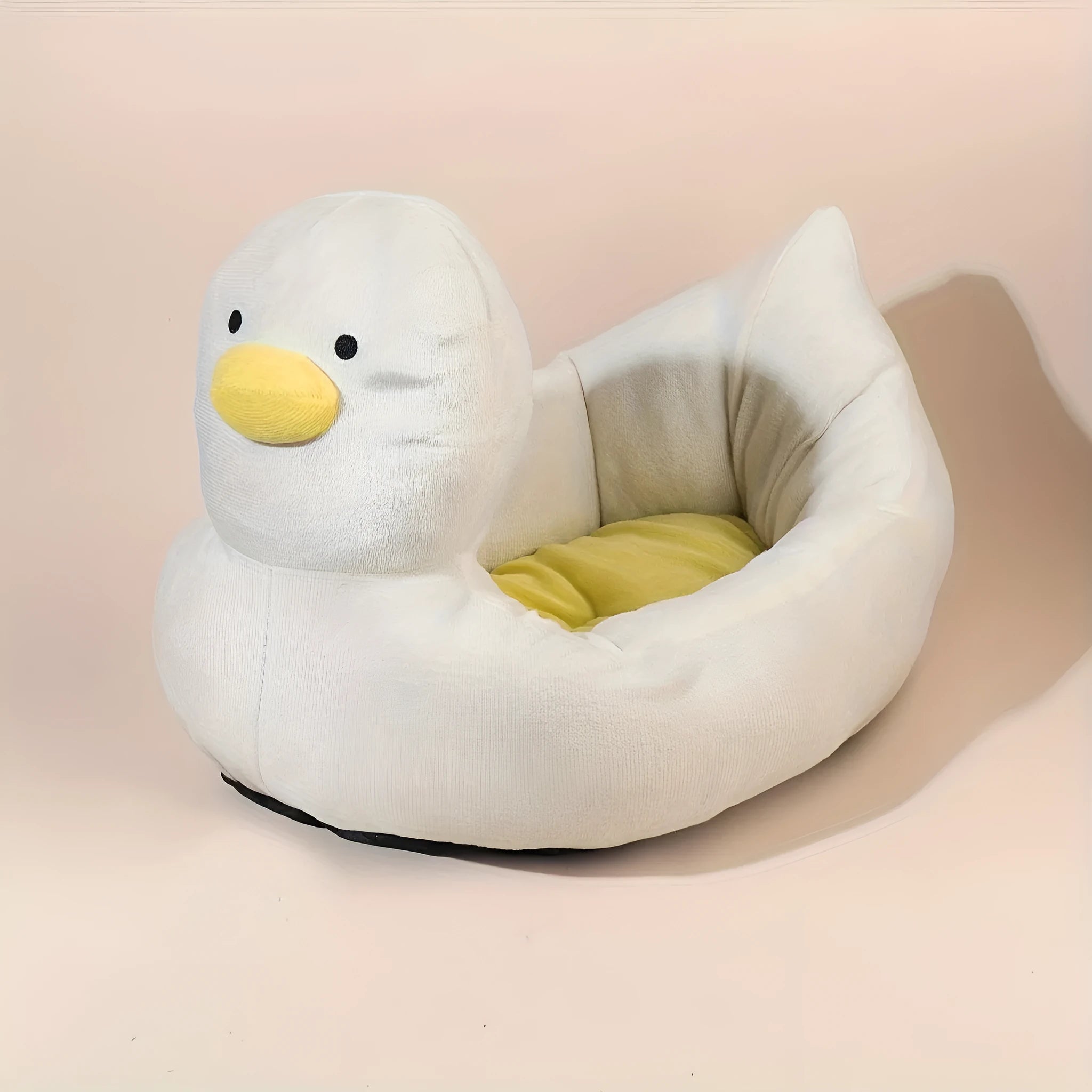 Blue duck-shaped soft polyester pet bed sofa for small dogs and cats on a wooden floor.