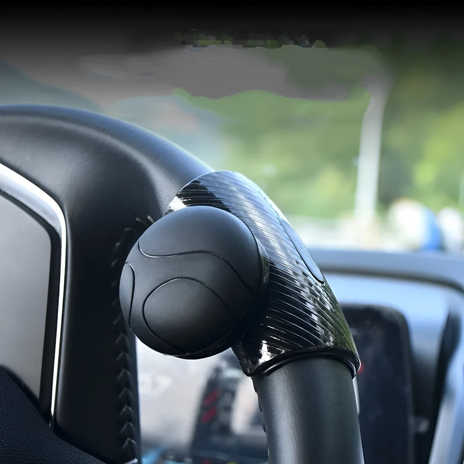 Black steering wheel assist ball with metal bearing for single-hand vehicle steering