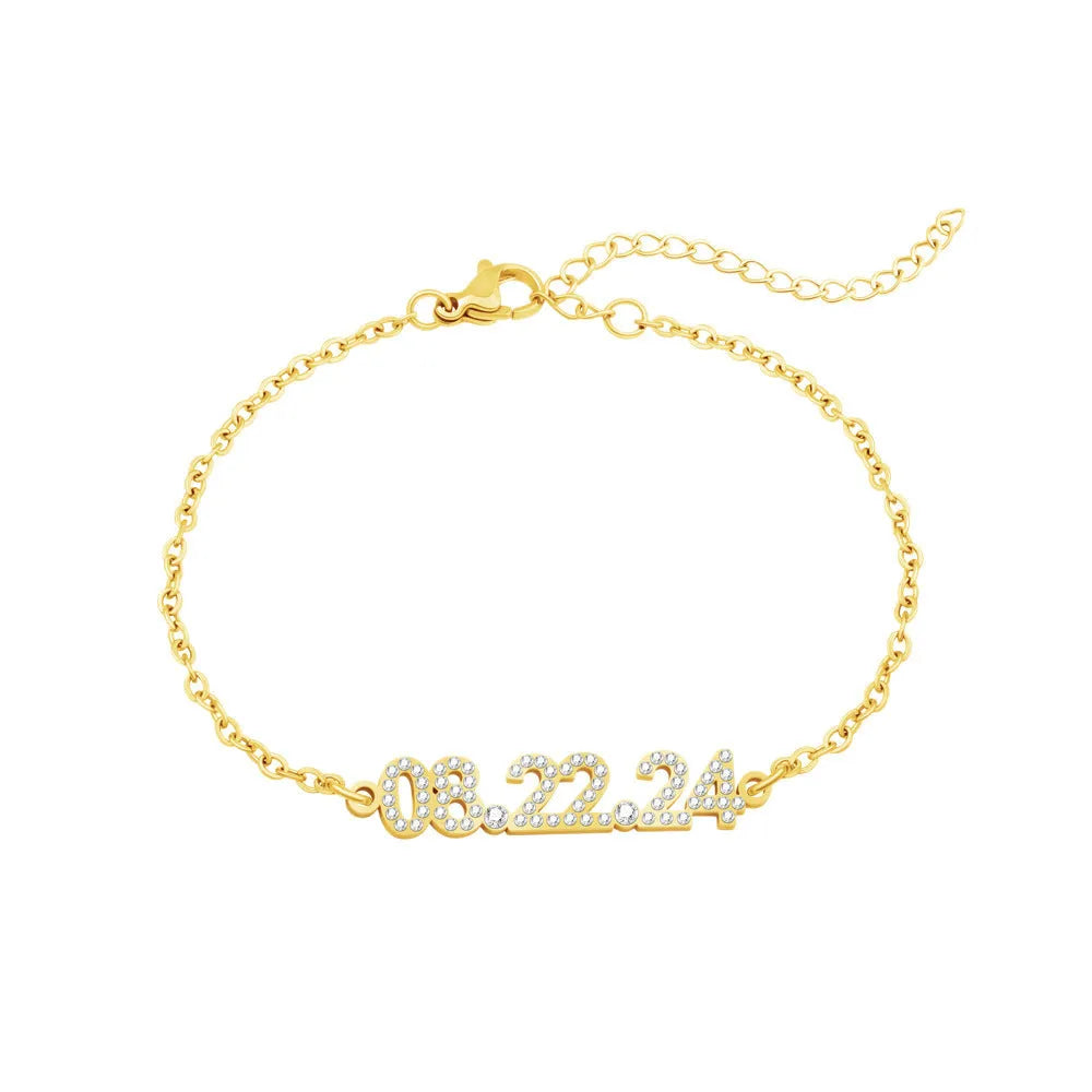 Stainless steel digital bracelet and necklace with diamond-set numbers in gold, rose gold, or steel colour.